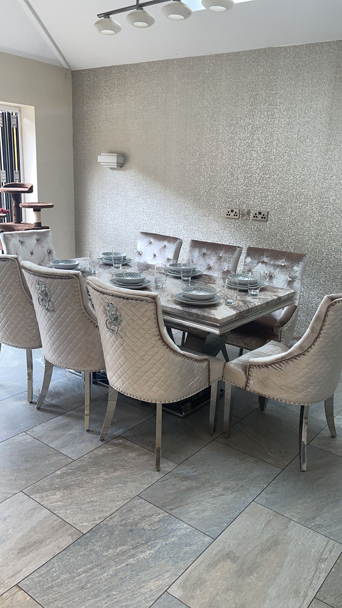 Ariel Marble Dining Table Biege With Bentley Mink  Lion Knocker Chairs